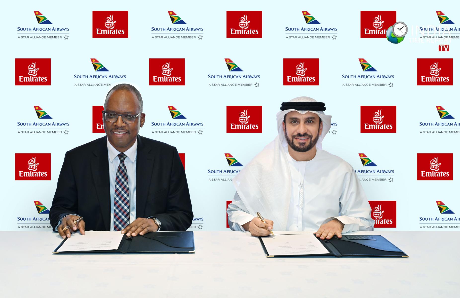Emirates and South African Airways officials signing the expanded codeshare partnership agreement