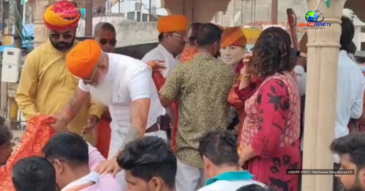 Raj Shekhawat offering floral tribute at Chaudhary Charan Singh statue during the Karni Sena Delhi march in Sadabad.